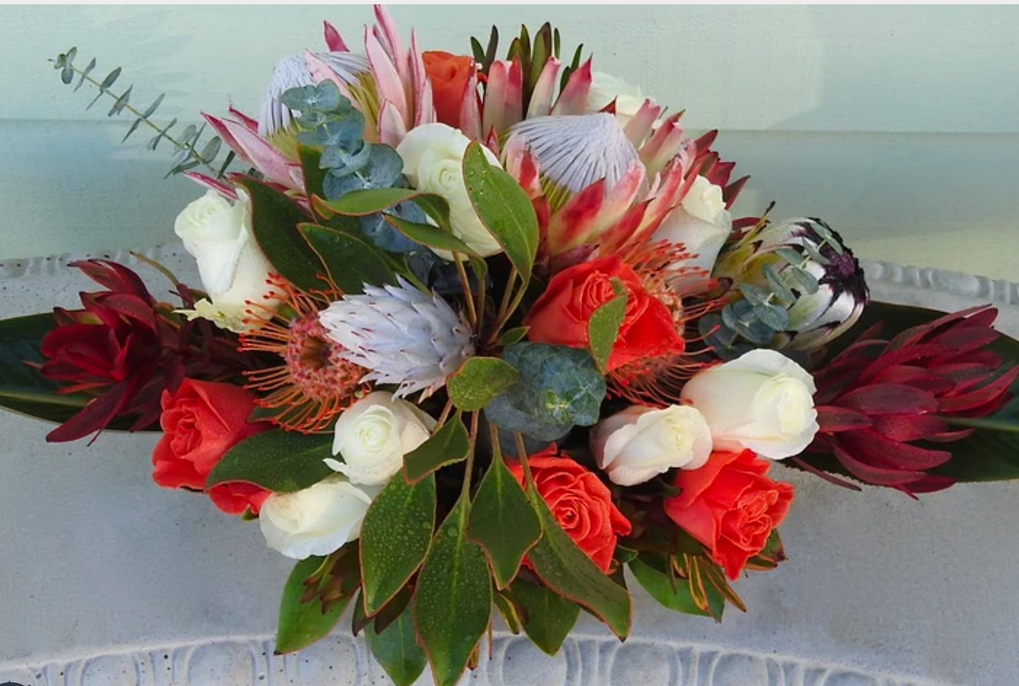 Tropical Sympathy Sprays & Headstone Arrangements