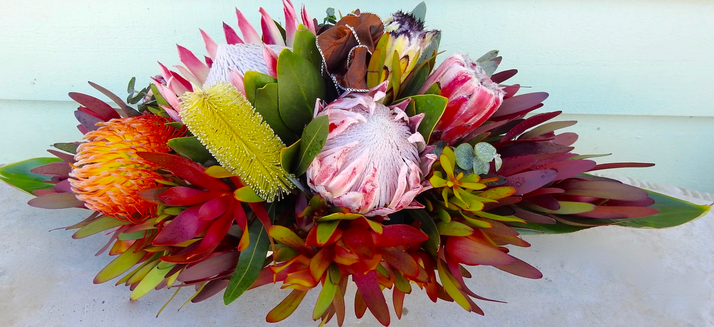 Tropical Sympathy Sprays & Headstone Arrangements